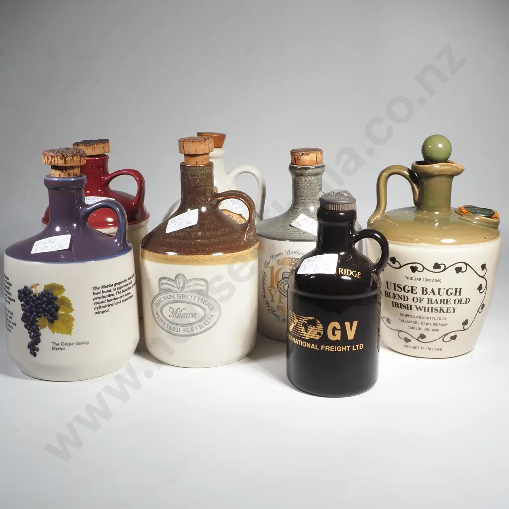 Assorted Vintage Pottery Branded Liquor Bottles Image 1++