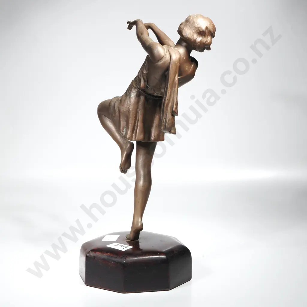 Art Deco Sculpture in Spelter Depicting A Dancer on a Wooden Octagonal Base Image 1++