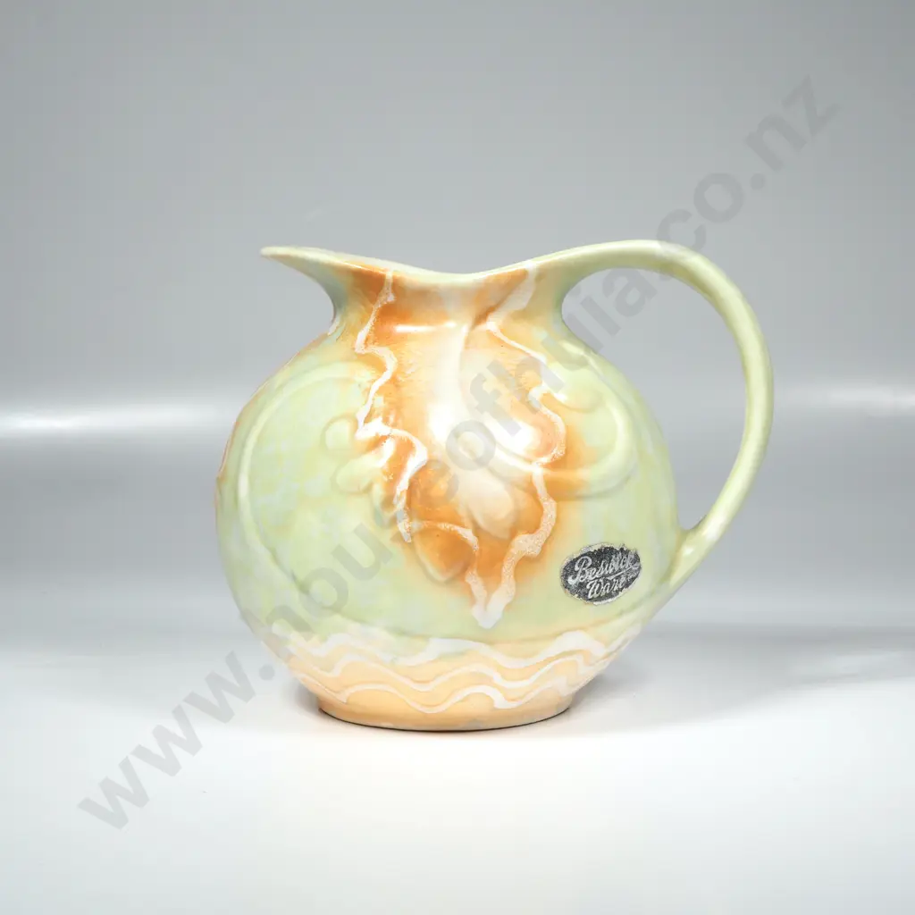 Burslem Ware Pitcher w a Green & Orange Glaze w a Raised Scroll Pattern Image 1++