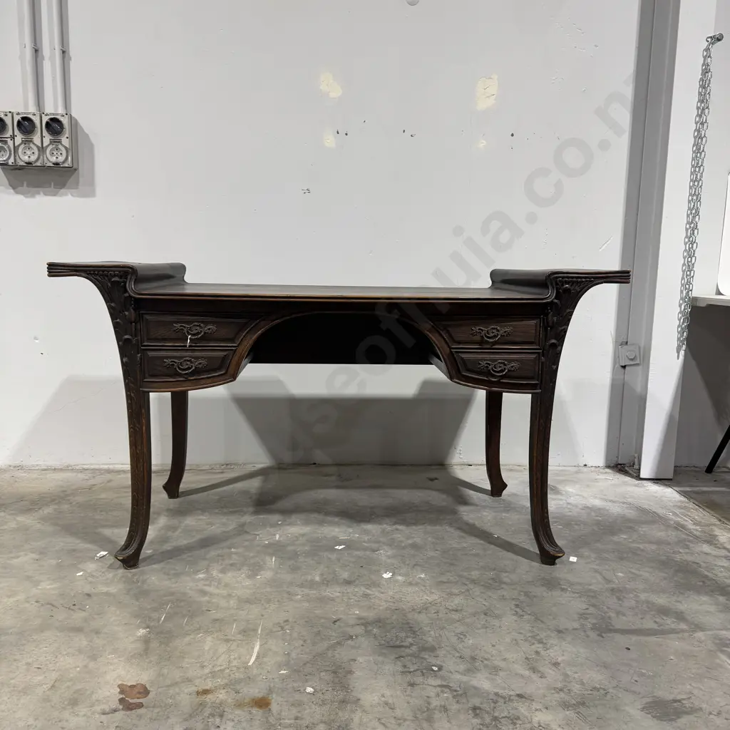 French Oak Art Nouveau Desk w Four Drawers & Ornate Handles, Carved Apron & Flared Legs, The Top Flanked by Shaped Arms Image 1++