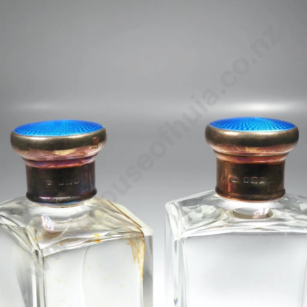Leather cased pair of glass scent bottles with sterling silver and blue enamel screw on tops, HM London 1928 Image 1++
