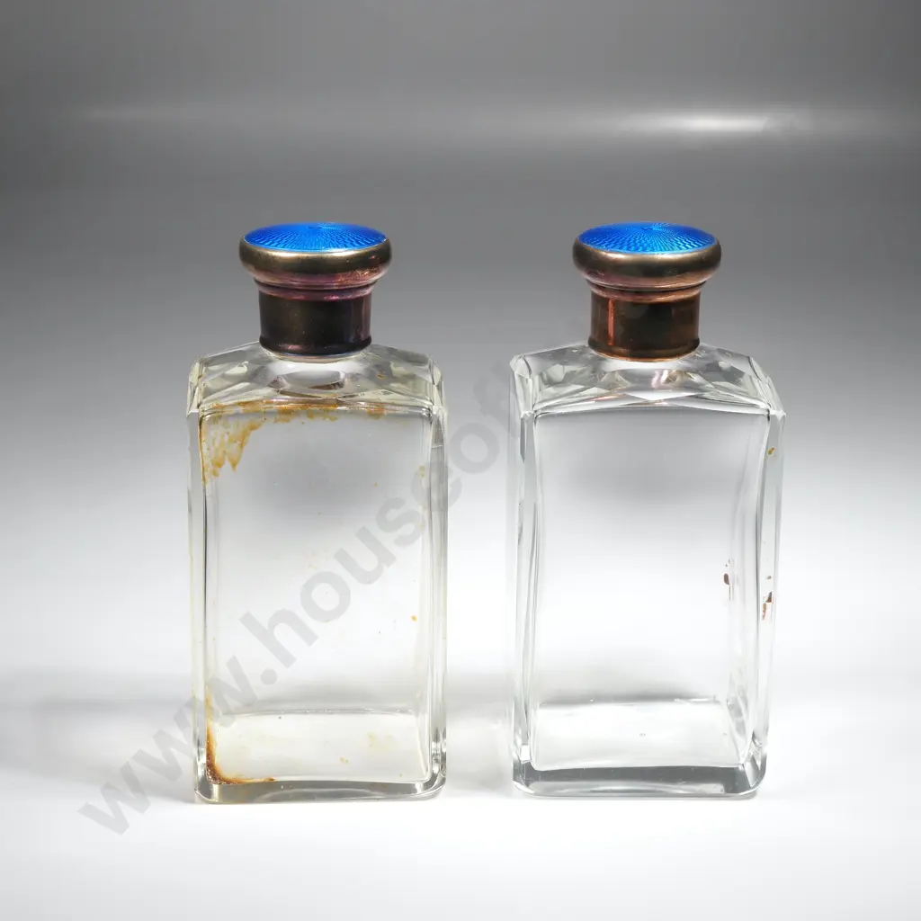 Leather cased pair of glass scent bottles with sterling silver and blue enamel screw on tops, HM London 1928 Image 1++