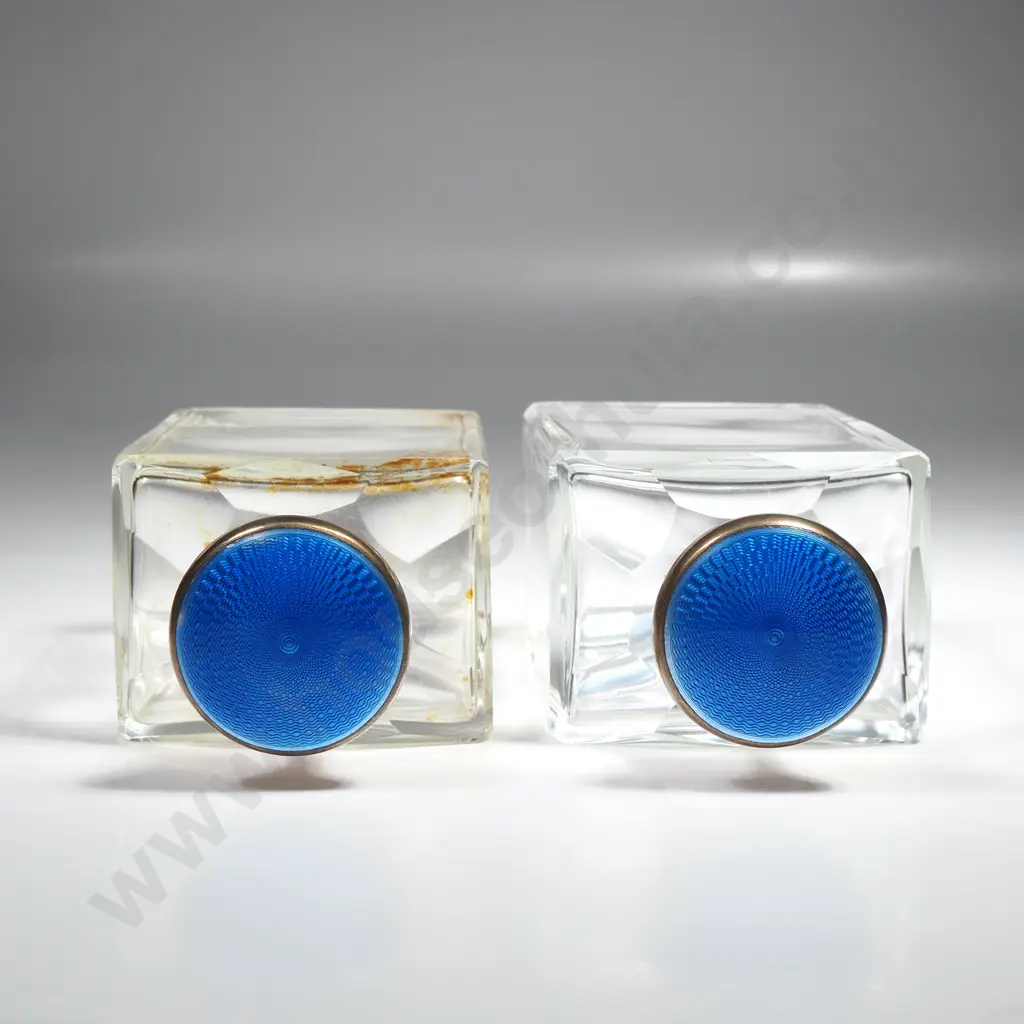 Leather cased pair of glass scent bottles with sterling silver and blue enamel screw on tops, HM London 1928 Image 1++