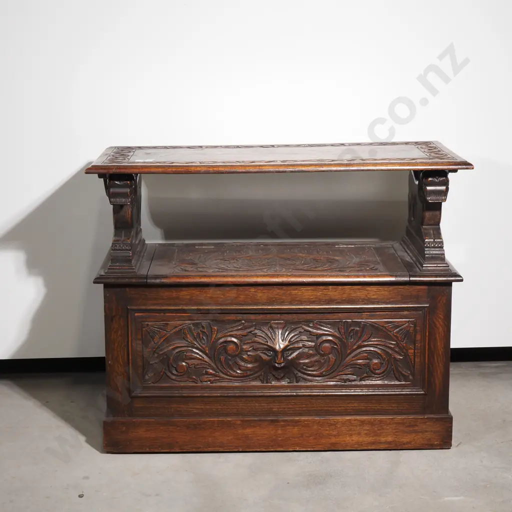 Antique Carved Monks Bench Heavily Decorated w Relief Carvings including Scrolls, Acanthus Leaves & Iron Mask Armrests Image 1++