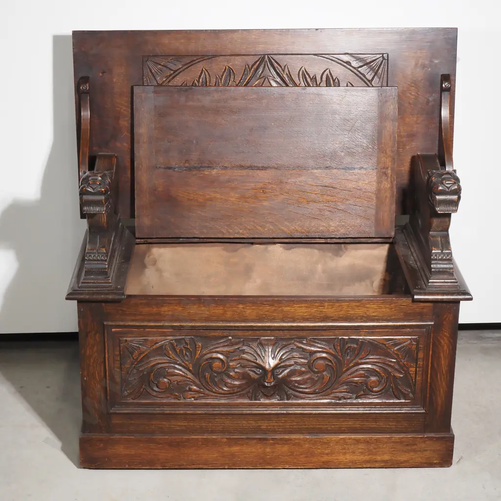 Antique Carved Monks Bench Heavily Decorated w Relief Carvings including Scrolls, Acanthus Leaves & Iron Mask Armrests Image 1++