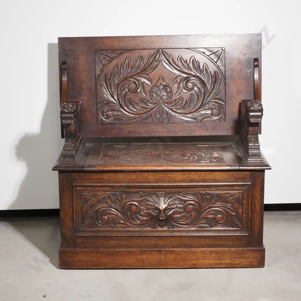 Antique Carved Monks Bench Heavily Decorated w Relief Carvings including Scrolls, Acanthus Leaves & Iron Mask Armrests Image 1++