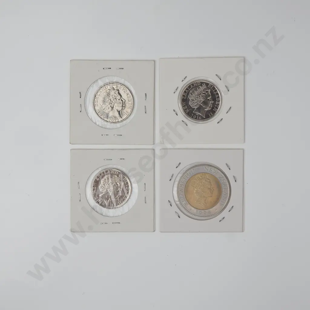 Four Different NZ Fifty Cent Coins Image 1++