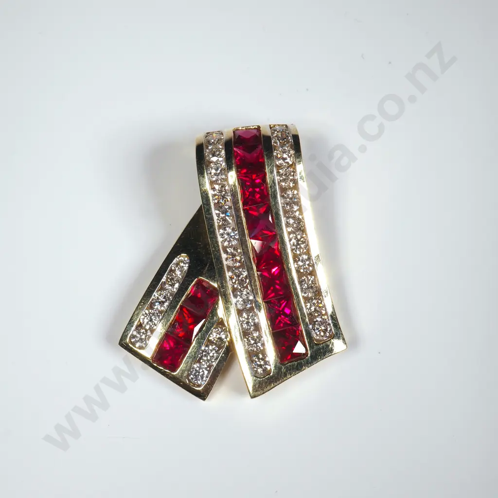 18ct Gold Diamond & Ruby Pendant w Valuation for $9,520.00 - Matches Following Lots Image 1++