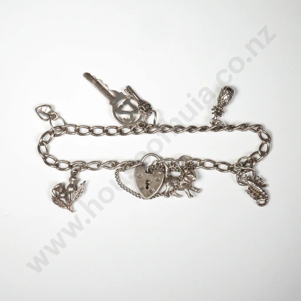 Sterling Silver Charm Bracelet to Include Scorpion, Key & Pineapple Image 1++