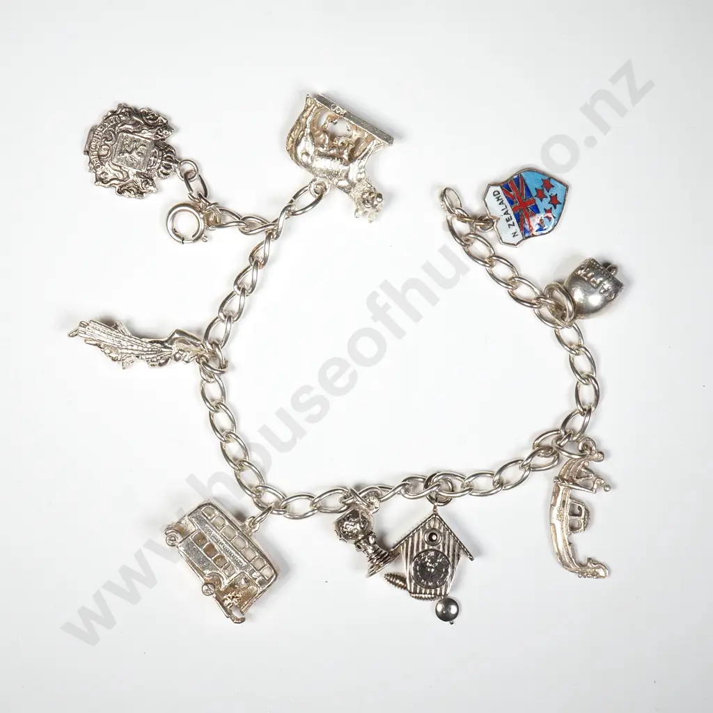 Sterling Silver Charm Bracelet to Include Bus, Wolf & Clock Image 1++