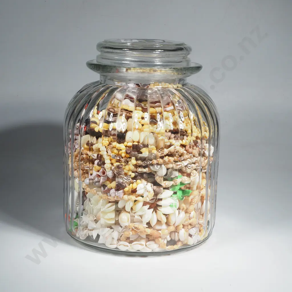 Large Quantity of Shell Necklaces in Large Glass Jar Image 1++