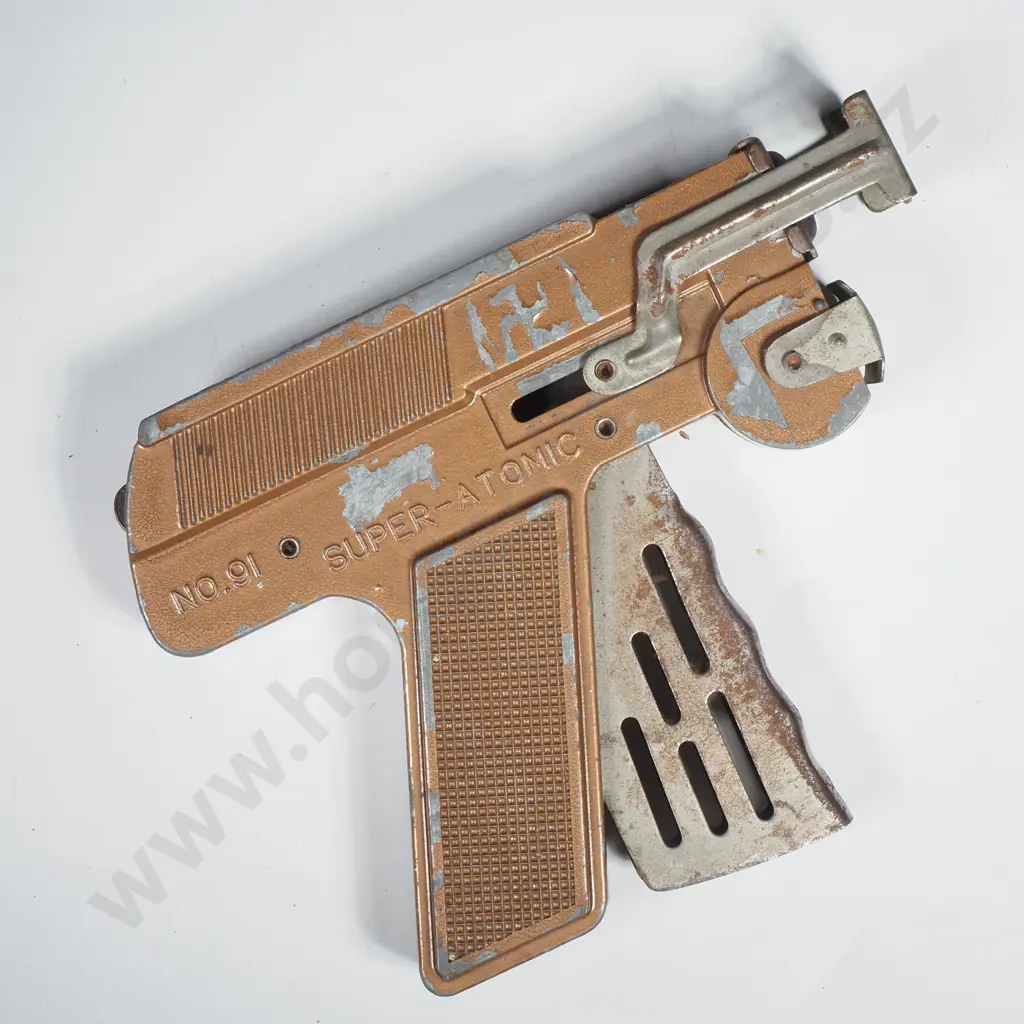 A Super Atomic No 91 Repeater Paper Buster Gun w Brown Body Image 1++