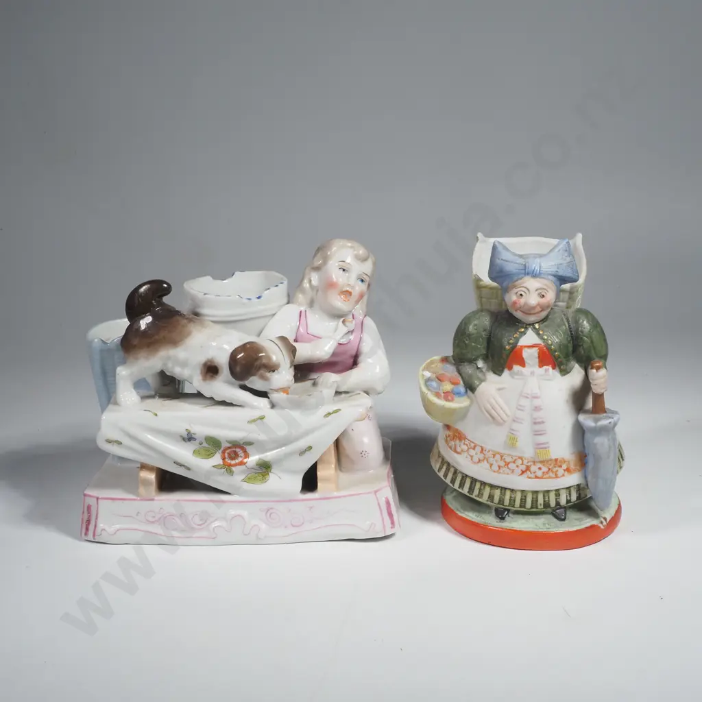 Two German Figural Match Holders/Striker, One Bisque w an Old Woman & Umbrella, the Other Glazed w Young Girl & Dog Image 1++
