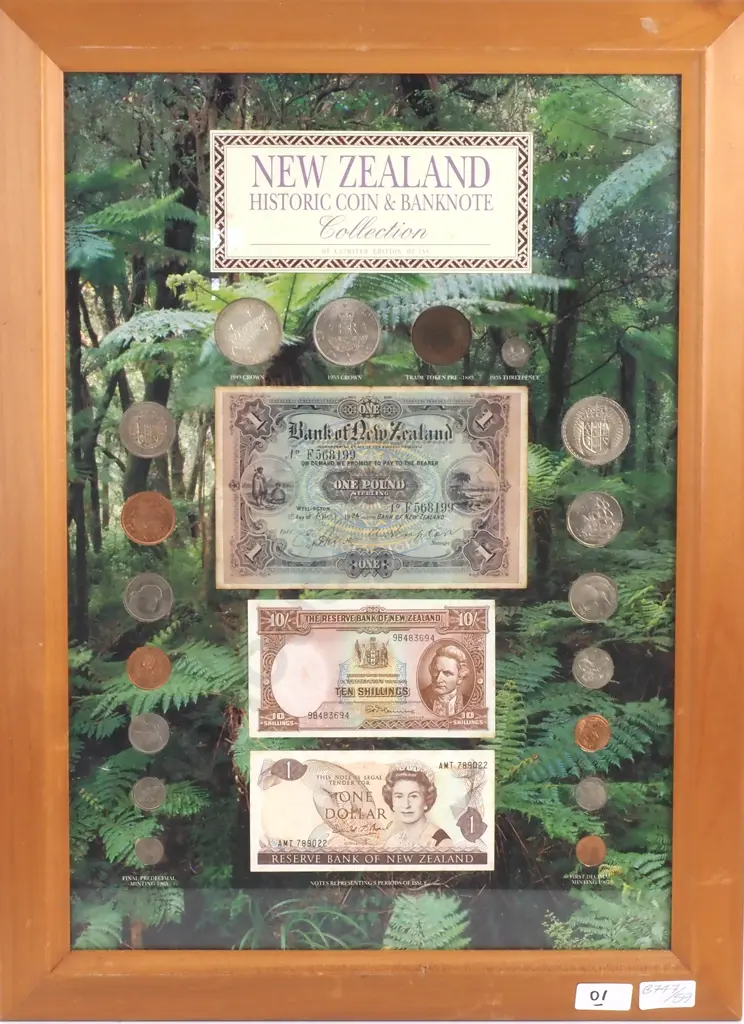 Framed “NEW ZEALAND HISTORIC COIN & BANKNOTE COLLECTION” consisting of a complete set of uncirculated 1965 and 1967 coins, 1949 and 1953 crowns, a Hobday & Jobberns one penny trade token in extremely fine condition, a 1935 threepence, a Bank of New Zealand one pound trading bank note hand signed and dated 1st April, 1924 in what appears to be in at least fine condition, a Fleming signature ten shillings in uncirculated condition and a Brash signature one dollar in uncirculated condition, some foxing to the notes Image 1++