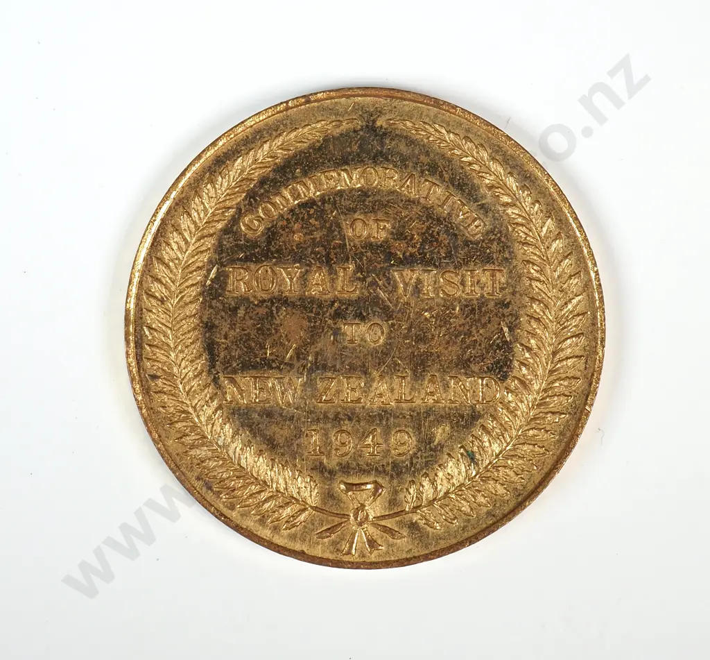 Gilt medal struck  to commemorate the proposed Royal visit of King George VI and Queen Elizabeth in 1949. 35mm. It is listed in the Catalogue of New Zealand Commemorative Medals 1941-2007 by Hamish MacMaster as number 1949/3 and is very rare Image 1++