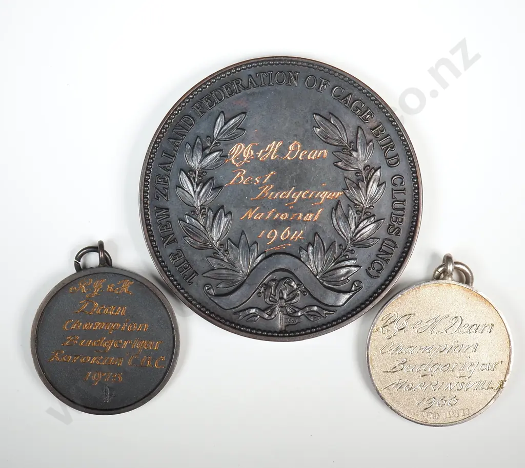 1 x sterling silver and two copper medals “THE NEW ZEALAND FEDERATION OF CAGE BIRD CLUBS ( INC )”, each award to Dean, 1960 to 1973, silver and one copper 25mm, one copper 48mm Image 1++