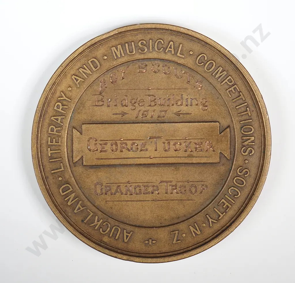 Antique bronze medal “AUCKLAND LITERARY AND MUSICAL COMPETITIONS SOCIETY N.Z.”, engraved “BOY SCOUT’S / BRIDGE BUILDING / 1910 / GEORGE TUCKER / GRANGER TROOP”, 54mm Image 1++