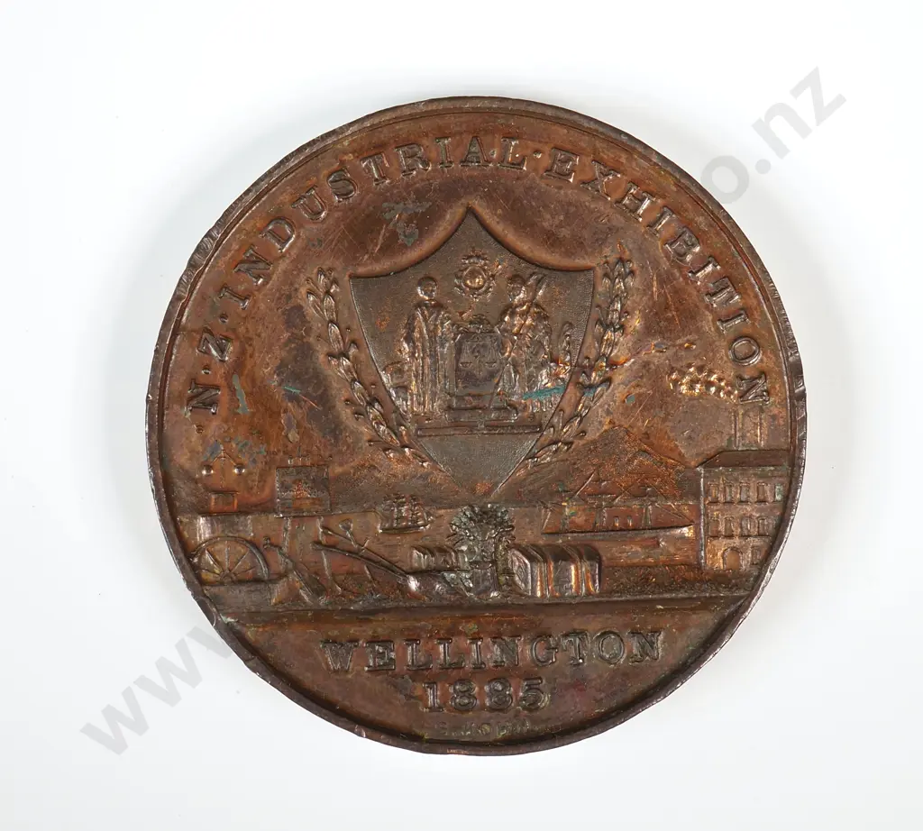 Bronze medal struck for the New Zealand Industrial Exhibition held in Wellington in 1885. Awarded to “WADDELL McLEOD & WEIR”. 42mm by 6.25mm thick. It is listed in the Medallic Commemoratives of New Zealand 1865-1940 by Leon Morel as number 1885/1 and has a rarity rating of R7 extremely rare ( 1 to 3 known ) Image 1++