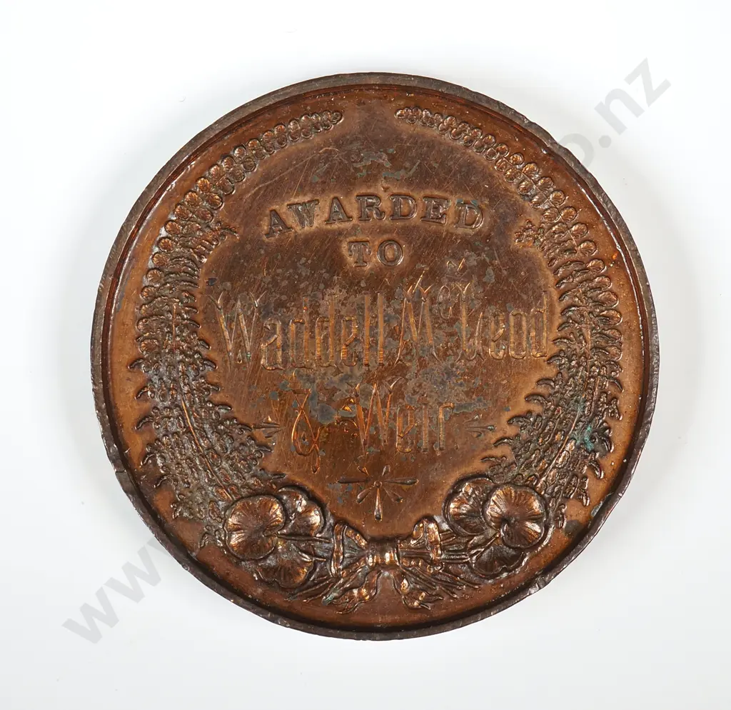Bronze medal struck for the New Zealand Industrial Exhibition held in Wellington in 1885. Awarded to “WADDELL McLEOD & WEIR”. 42mm by 6.25mm thick. It is listed in the Medallic Commemoratives of New Zealand 1865-1940 by Leon Morel as number 1885/1 and has a rarity rating of R7 extremely rare ( 1 to 3 known ) Image 1++