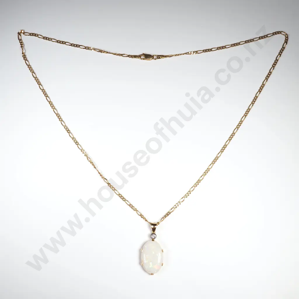 18ct Gold Solid Opal And Diamond Pendant With An 18ct Gold Chain Image 1++