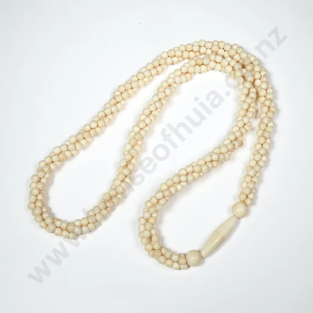 Single Strand of Twisted Small Bone Or Ivory Beads Image 1++