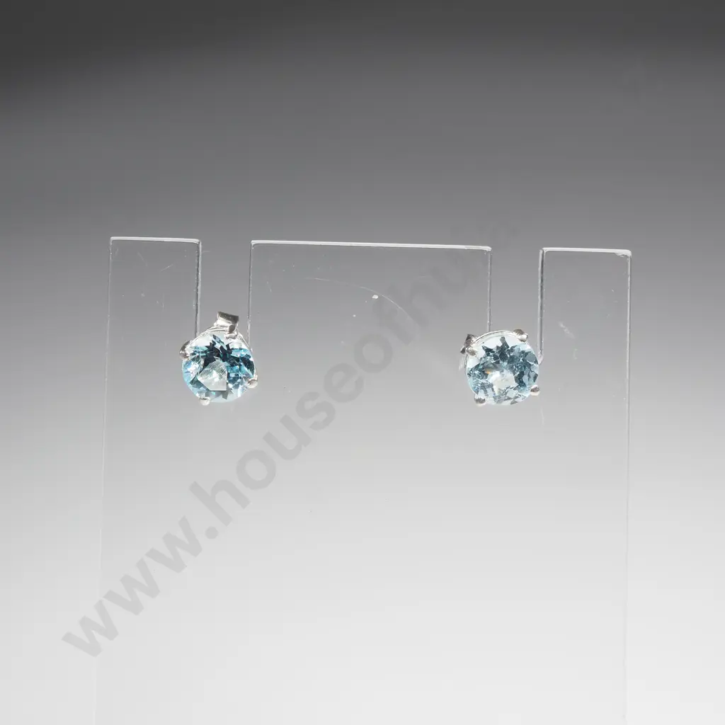 Pair of Sterling Silver Blue Topaz Stud Earrings Image 1++
