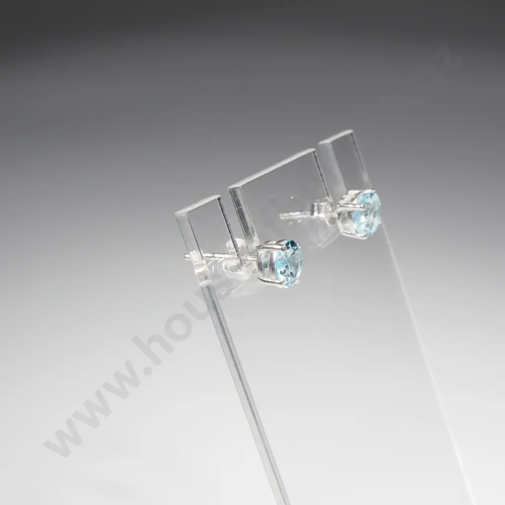 Pair of Sterling Silver Blue Topaz Stud Earrings Image 1++