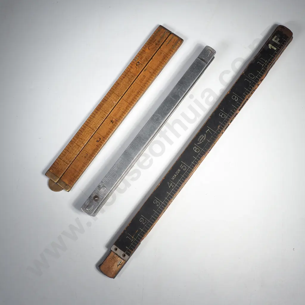 Three Folding Rulers including a Wood & Brass Rabone Rule, a Holbro 36" Rule & an Ahrems Metal Rule 78" Image 1++
