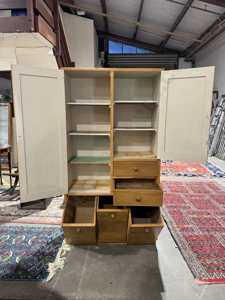 Rimu Combination Wardrobe or Compactum Cabinet w an Assymetrical Layout featuring Cupboards & Drawers Image 1++