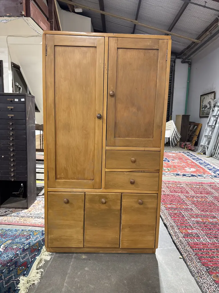 Rimu Combination Wardrobe or Compactum Cabinet w an Assymetrical Layout featuring Cupboards & Drawers Image 1++