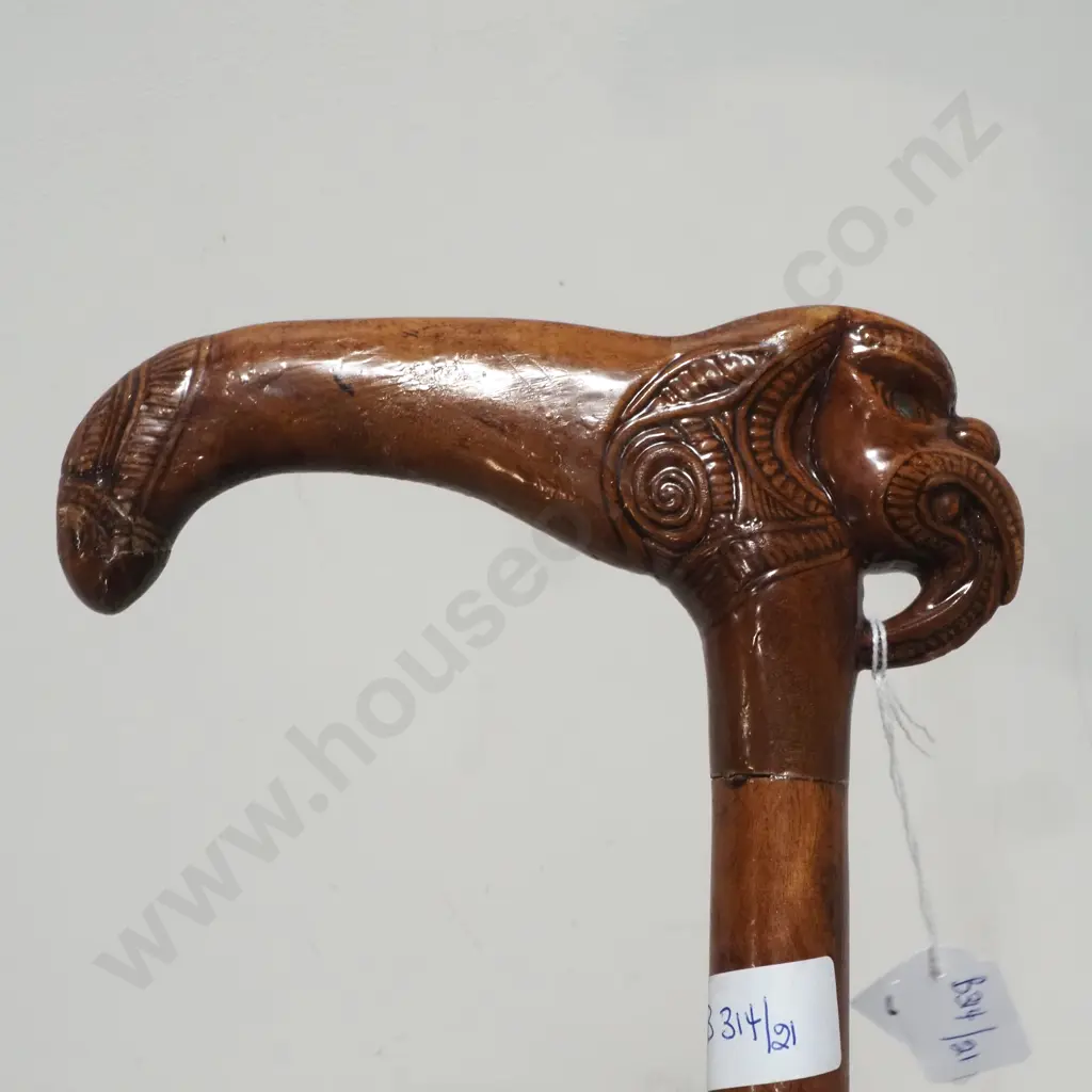 Handcrafted Wooden Walking Stick Featuring a Maori Carved Handle w Tiki Figures Image 1++