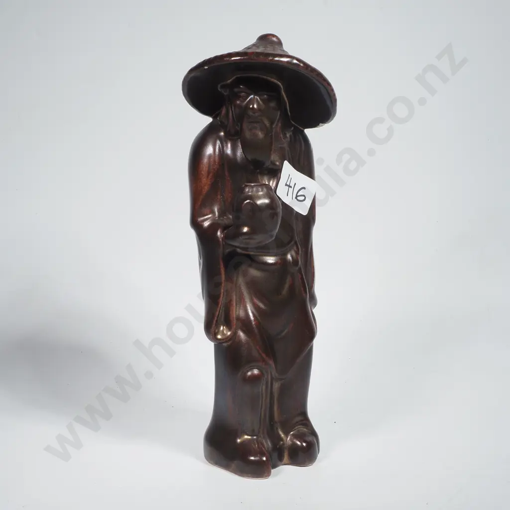 Glazed Pottery Figurine Depicting a Chinese Fisherman Wearing a Traditional Wide Brimmed Hat Image 1++
