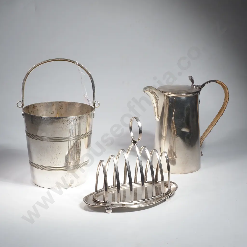 Silver Plated Water Jug w Woven Wicker Handle, Silver Plate Toast Rack w Oval Base & an Ice Bucket w Metal Strainer Image 1++