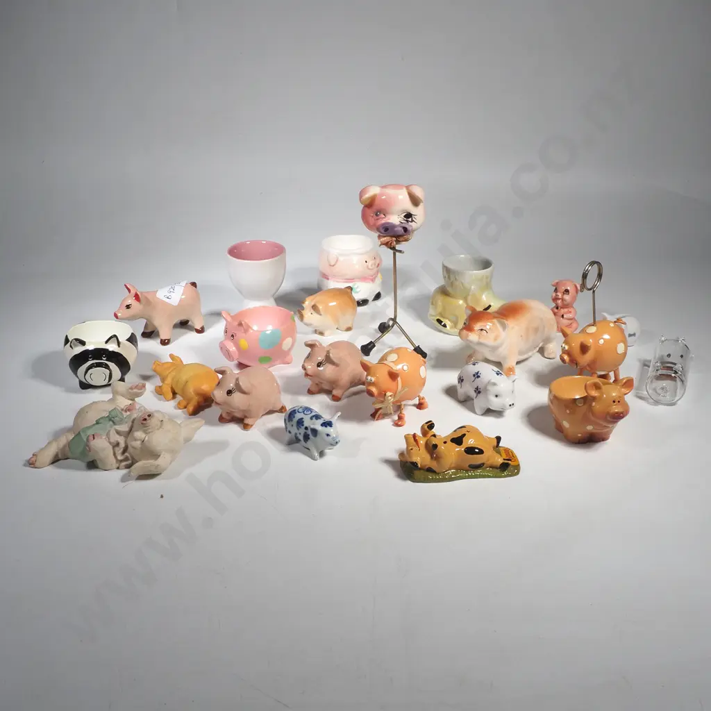 Collection of Pig Figurines & Pig Themed Egg Cups & a Small Pottery Salt Pig Image 1++