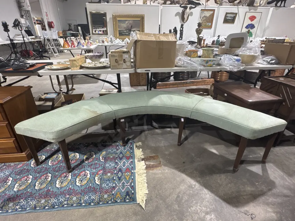 MCM Curved Upholstered Bench in Pale Green Fabric on Eight Legs Terminating in Spade Feet Image 1++