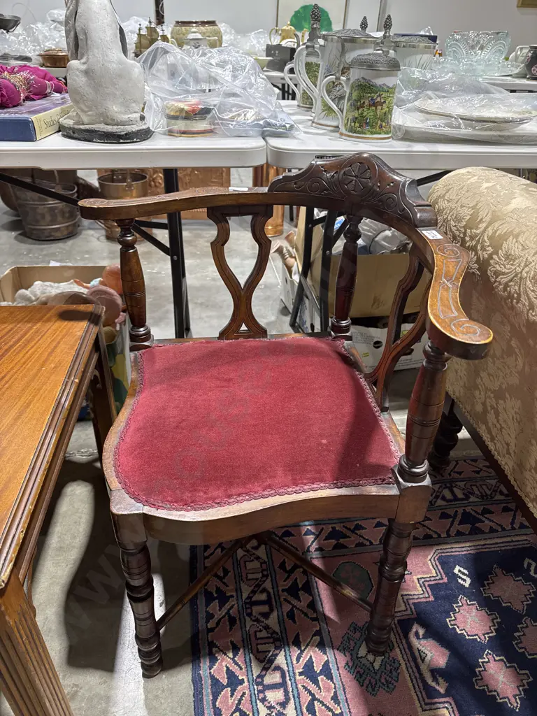 Edwardian Corner Wooden Armchair w Carved Crest Rail, Pierced Splats, Turned Spindle Supports & a Red Velvet Padded Seat Image 1++