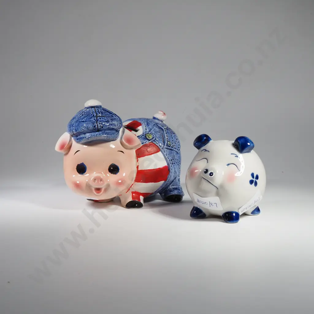 Two Ceramic Piggy Banks, One Wearing Dungarees Image 1++