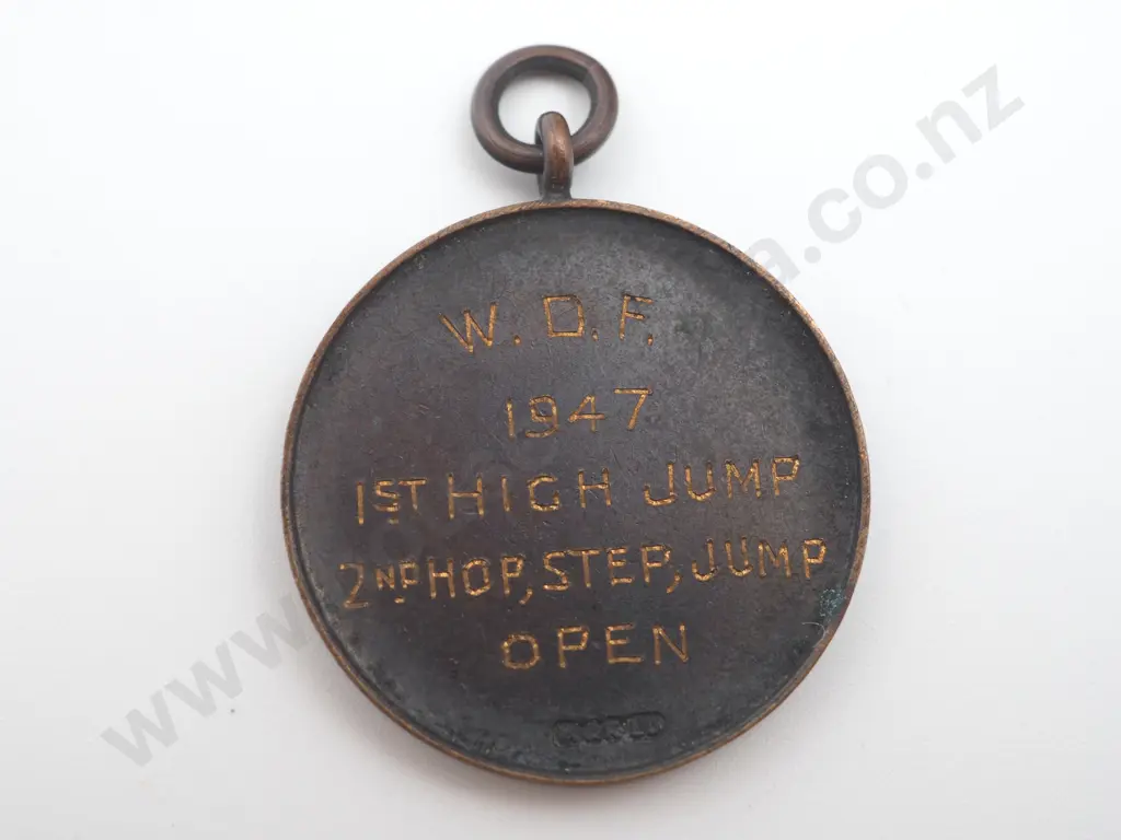 Vintage copper medal St Andrews College ( Christchurch ) engraved on the back “W.D.F. /         1947 Image 1++