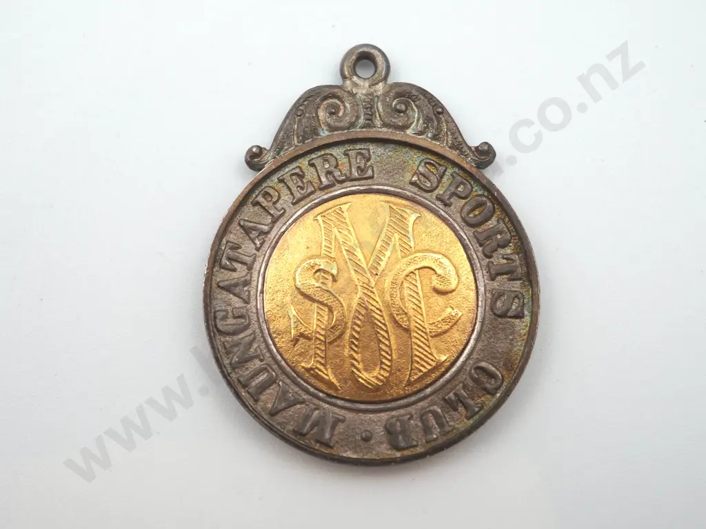 Antique sterling silver and gold “MAUNGATAPERE SPORTS CLUB” medal Image 1++