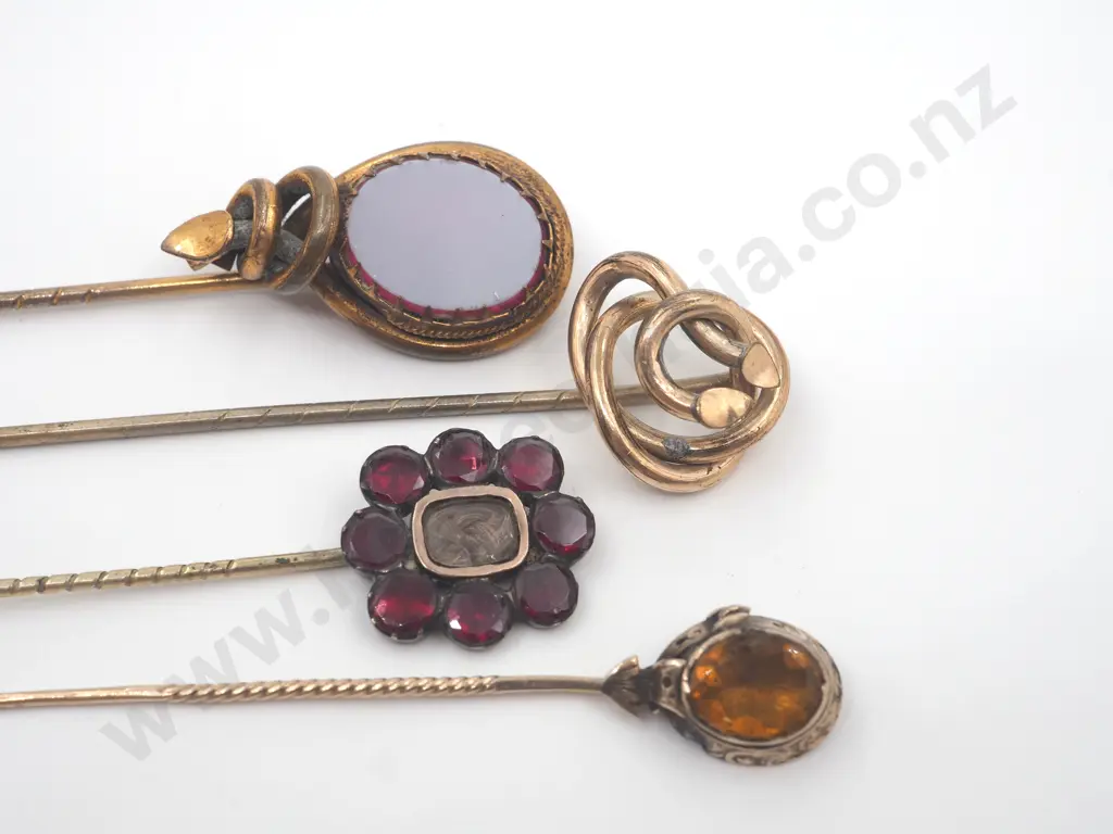 Four Gold Stick Pins (A Variety of Carats) Image 1++