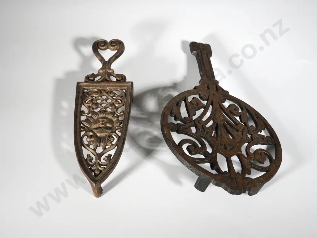 Two Cast Iron Decorative Trivets Image 1++