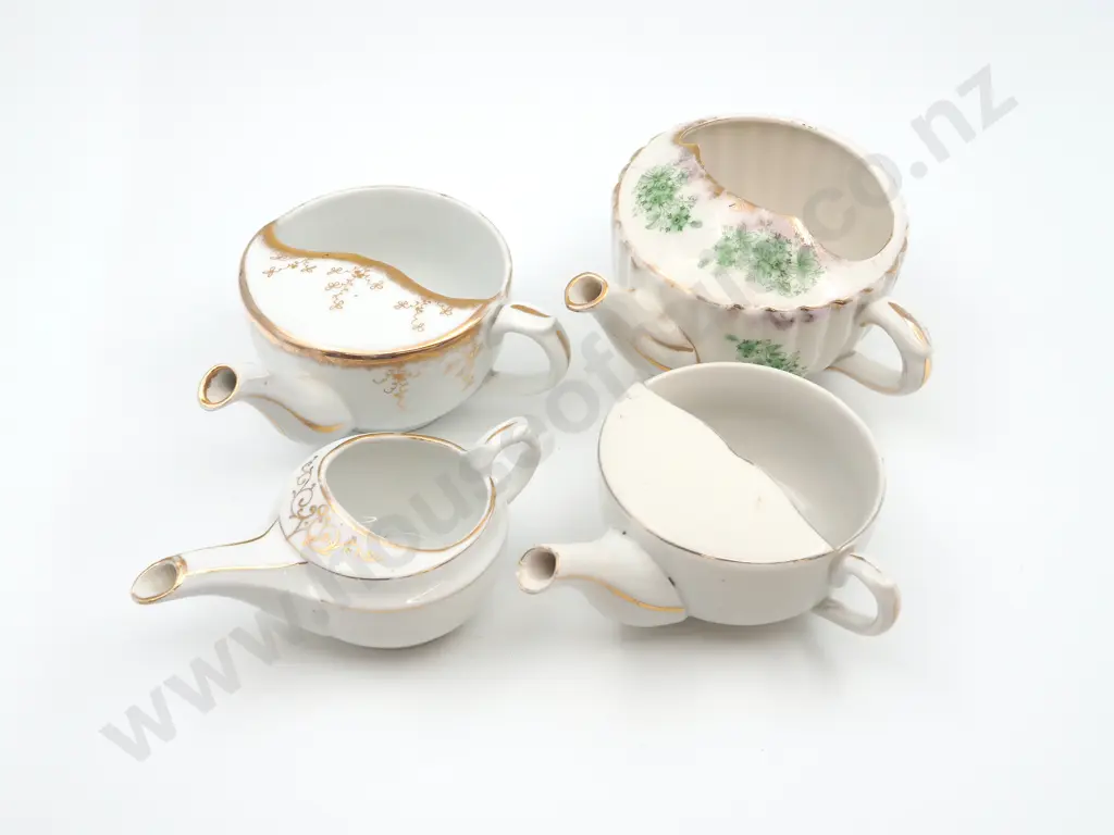 Four Invalid Tea Cups Image 1++