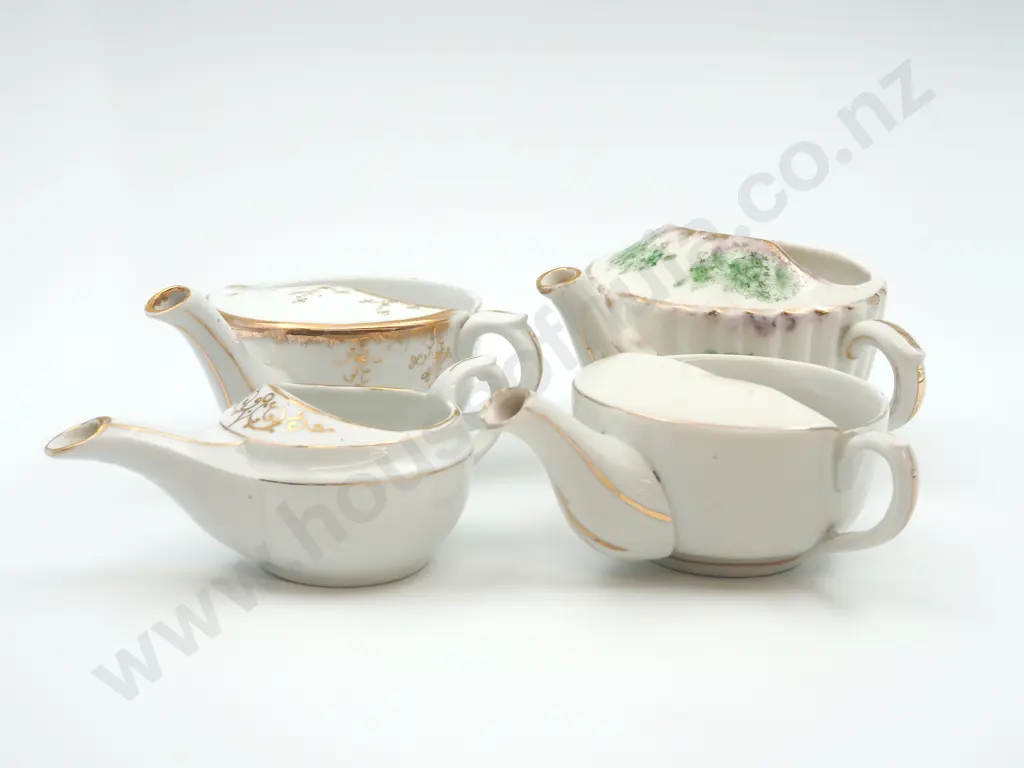 Four Invalid Tea Cups Image 1++