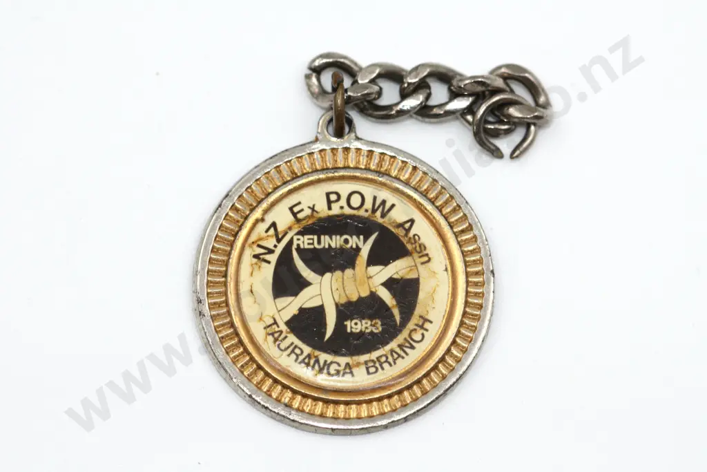 1983 NZ Ex P.O.W. Tauranga Branch Badge on Chain Image 1++