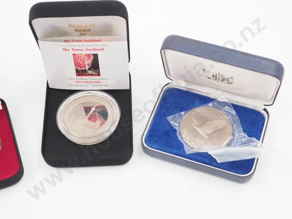 7 New Zealand Commemorative Cased Coins incl $5 and $10 coins Image 1++