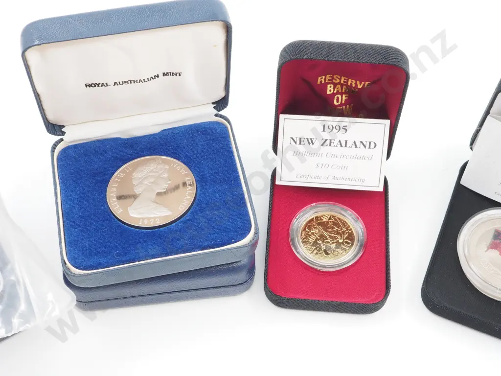 7 New Zealand Commemorative Cased Coins incl $5 and $10 coins Image 1++