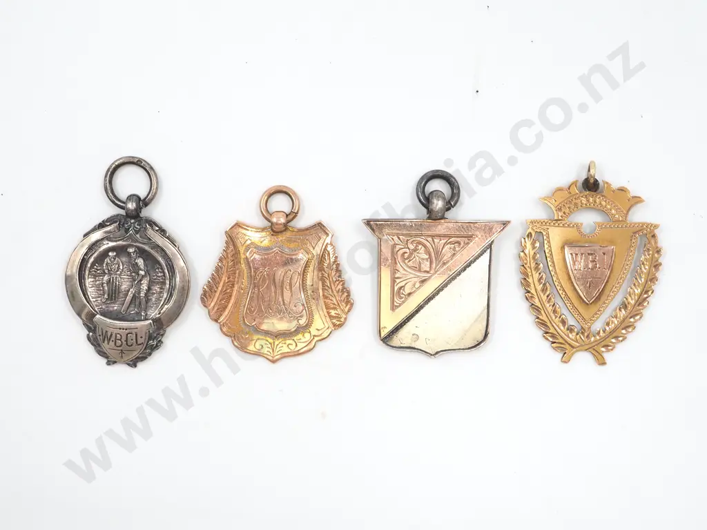 Collection of Sporting Prize Fobs to R Mclean: Two in 9ct Gold & 2 in Sterling Silver Image 1++
