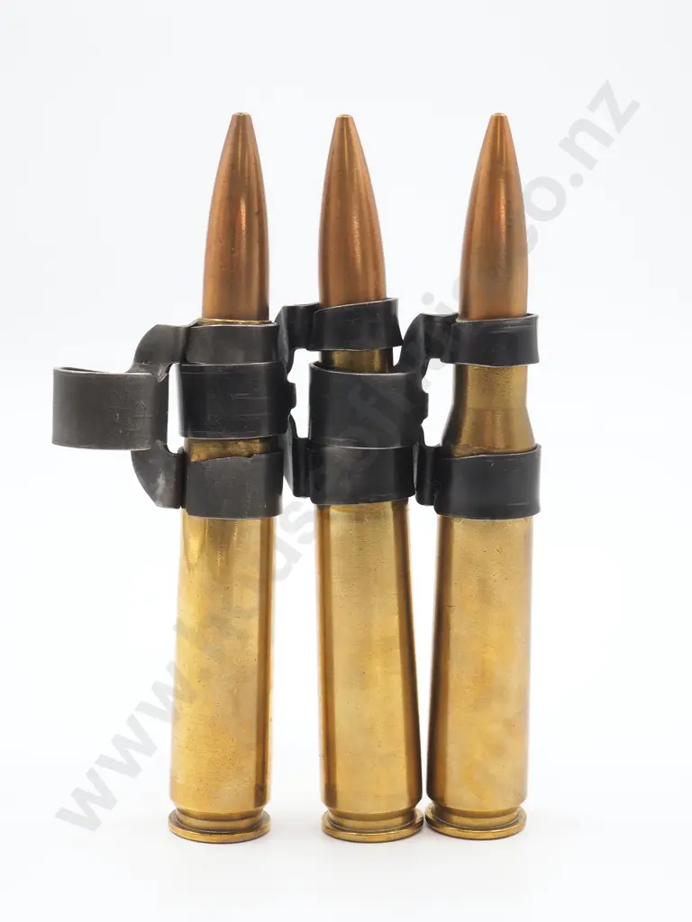 Steel Belt of .50 Calibre Ammunition: Inert & Three Bullets Image 1++