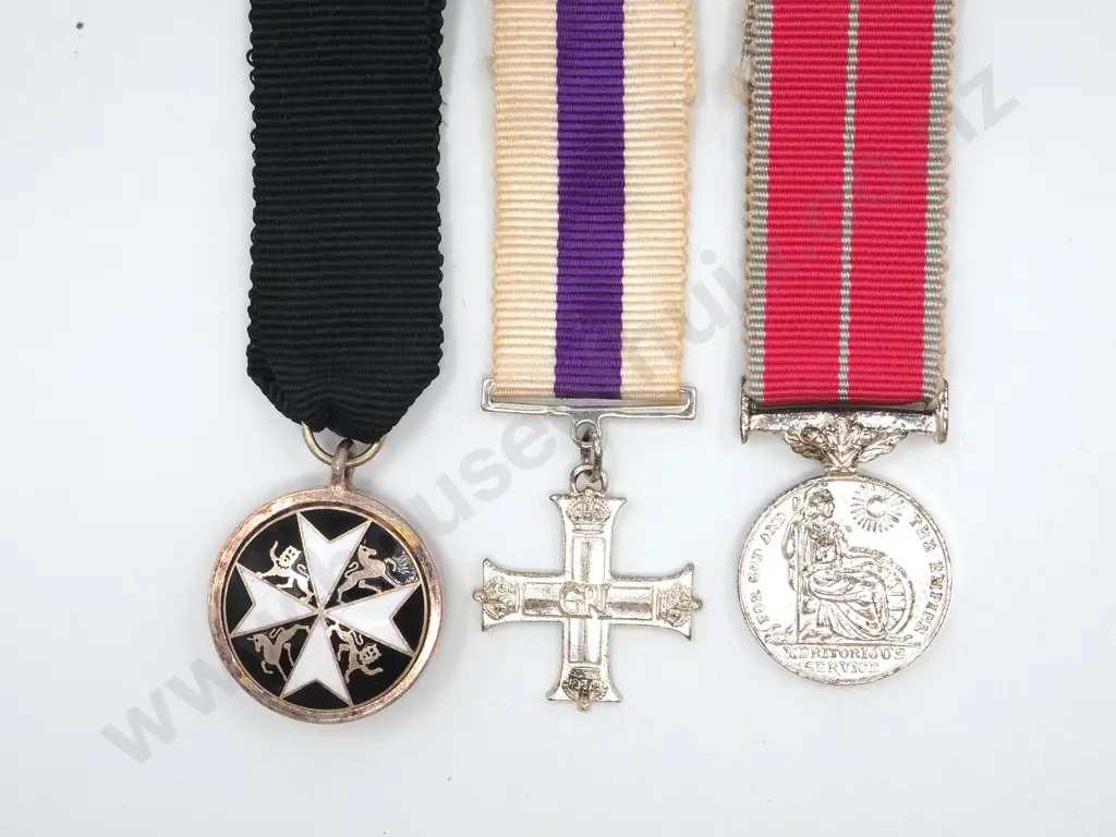 Three Miniature Decorations: Order of St John / Military Cross / BEM Image 1++