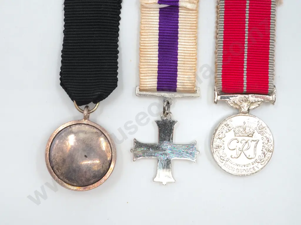Three Miniature Decorations: Order of St John / Military Cross / BEM Image 1++